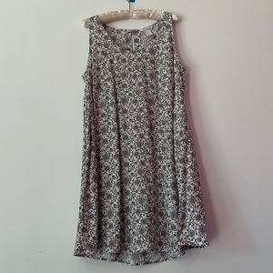 Sundress with pretty floral print.